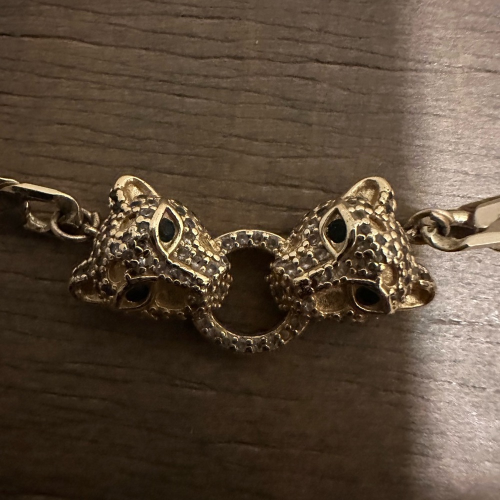 Gorgeous leopard gold necklace, green eyes